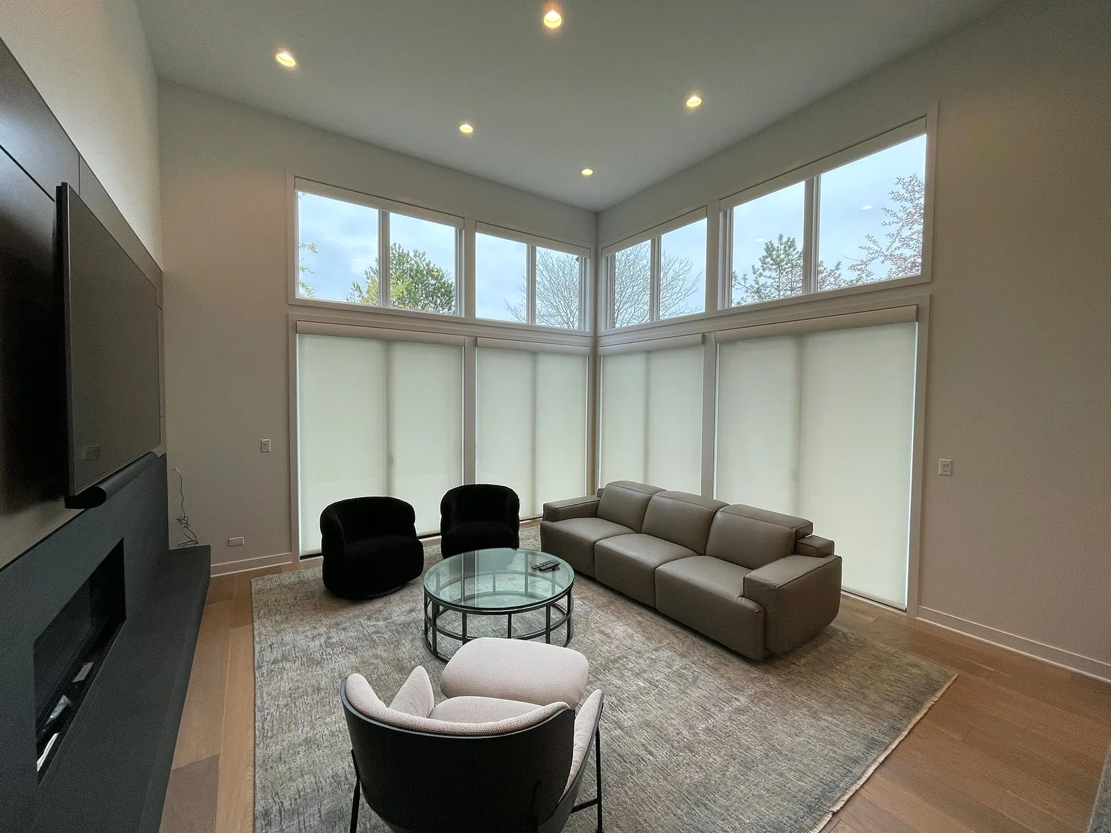 Custom window treatments installed across a finished living space